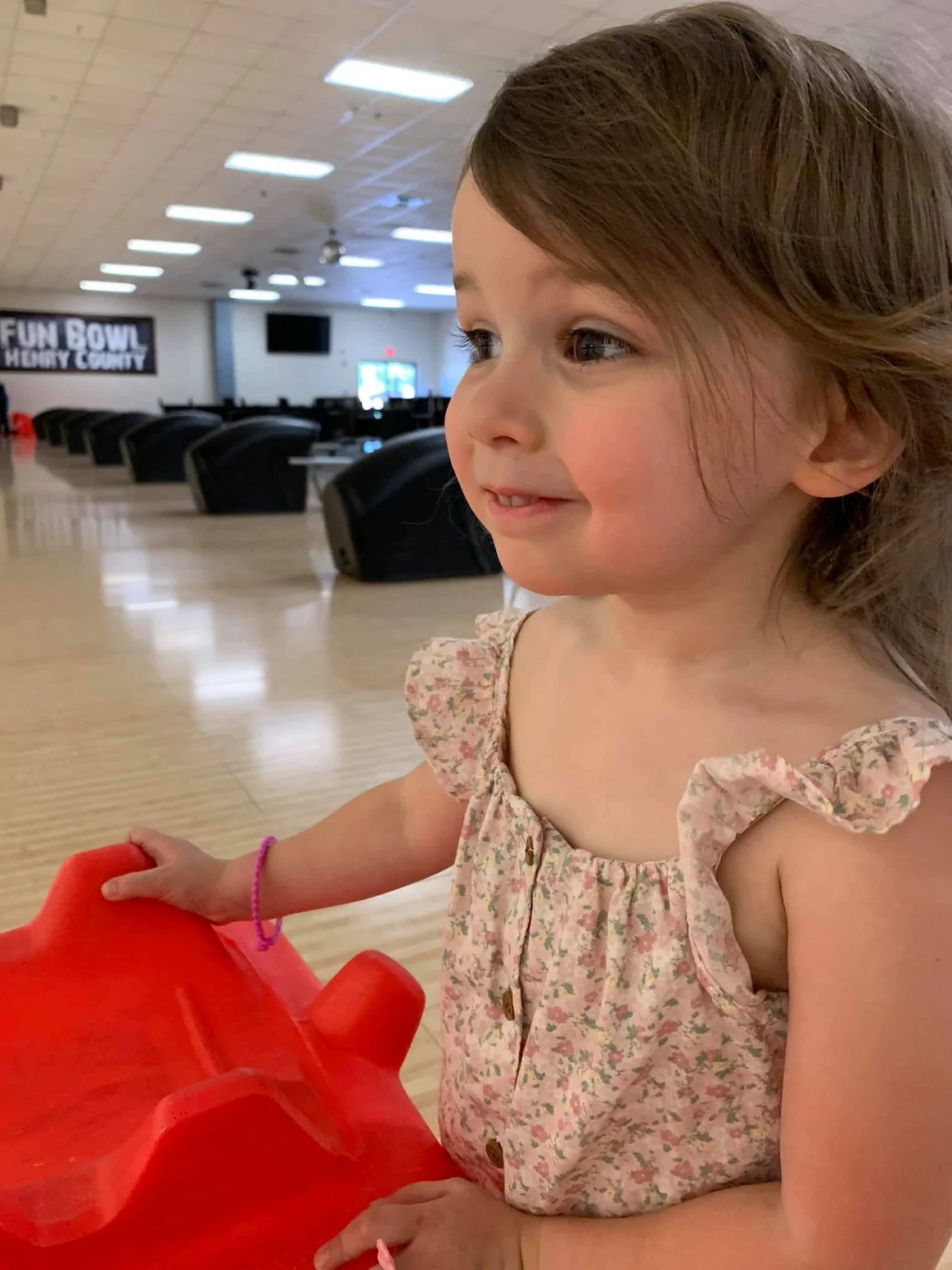 Child enjoying a visit to Fun Bowl Henry County